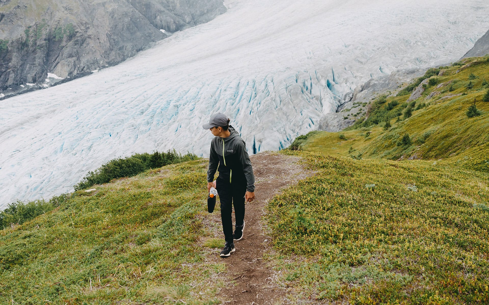 Person looking at the glaciers in Alaska