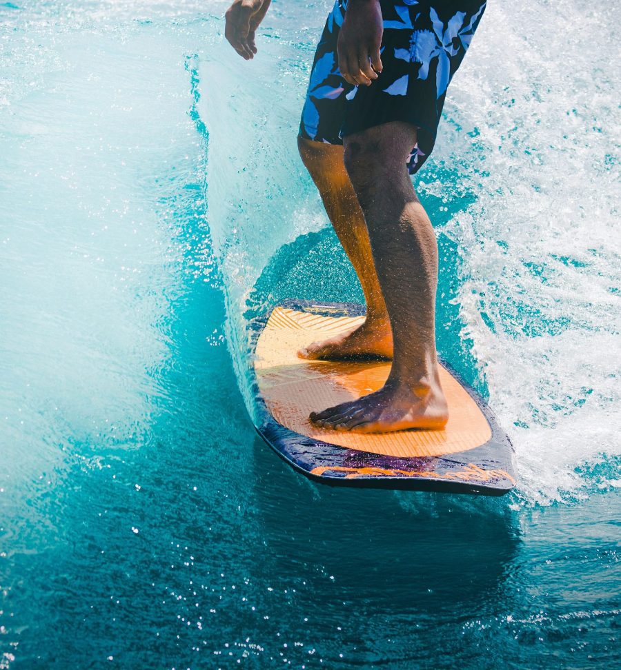 Travel nurse surfing in Hawaii