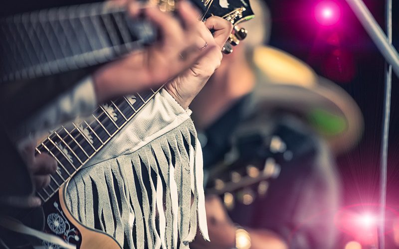 country band playing guitar closeup