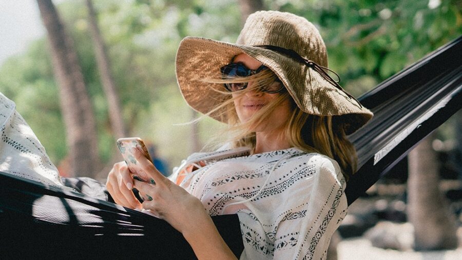 A postpartum nurse enjoying her time off in a hammock